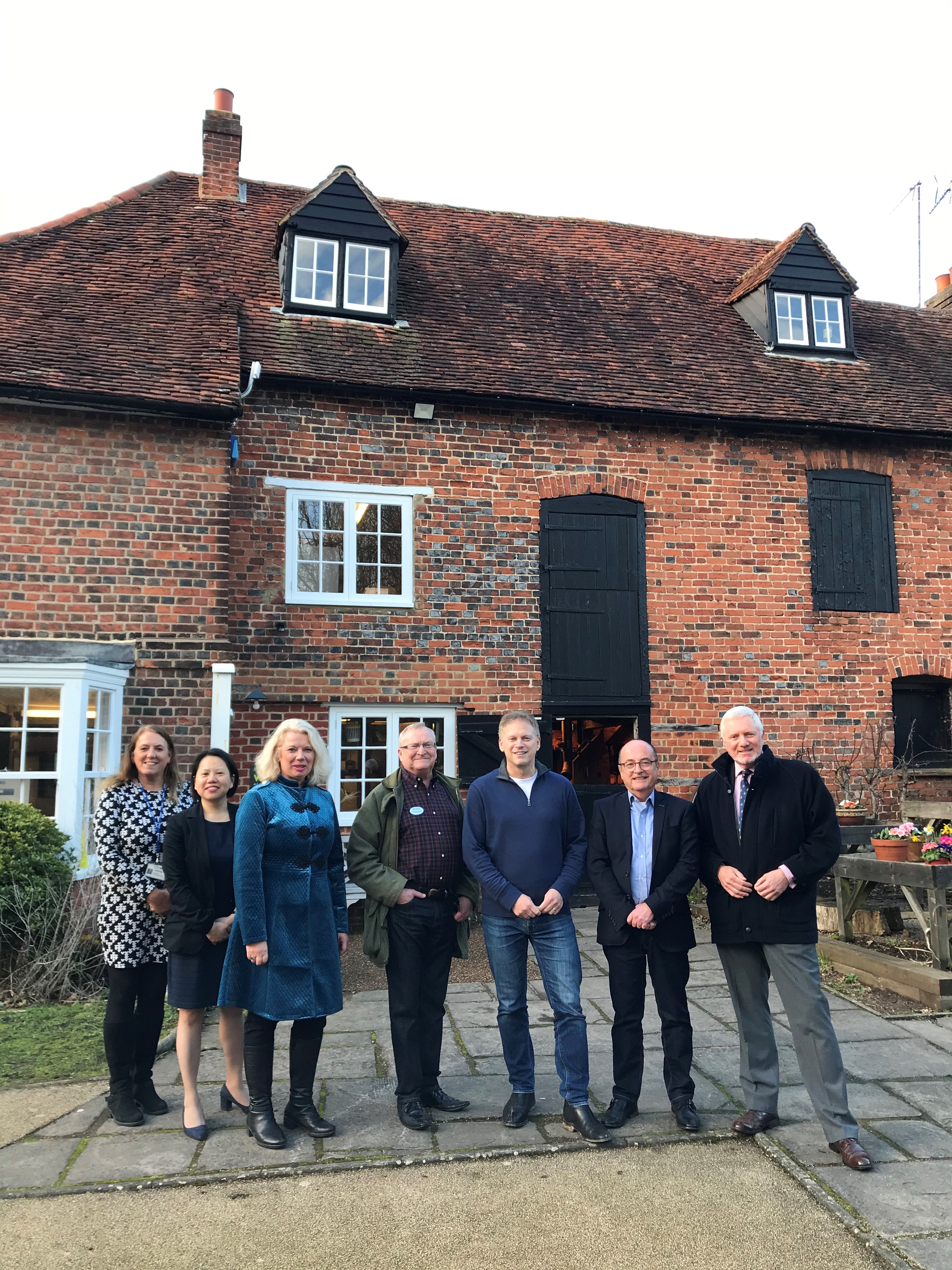 Councillors, MP Grant Shapps and Chief Executive Kg Ng standing outside Mill Green Musuem and Watermill