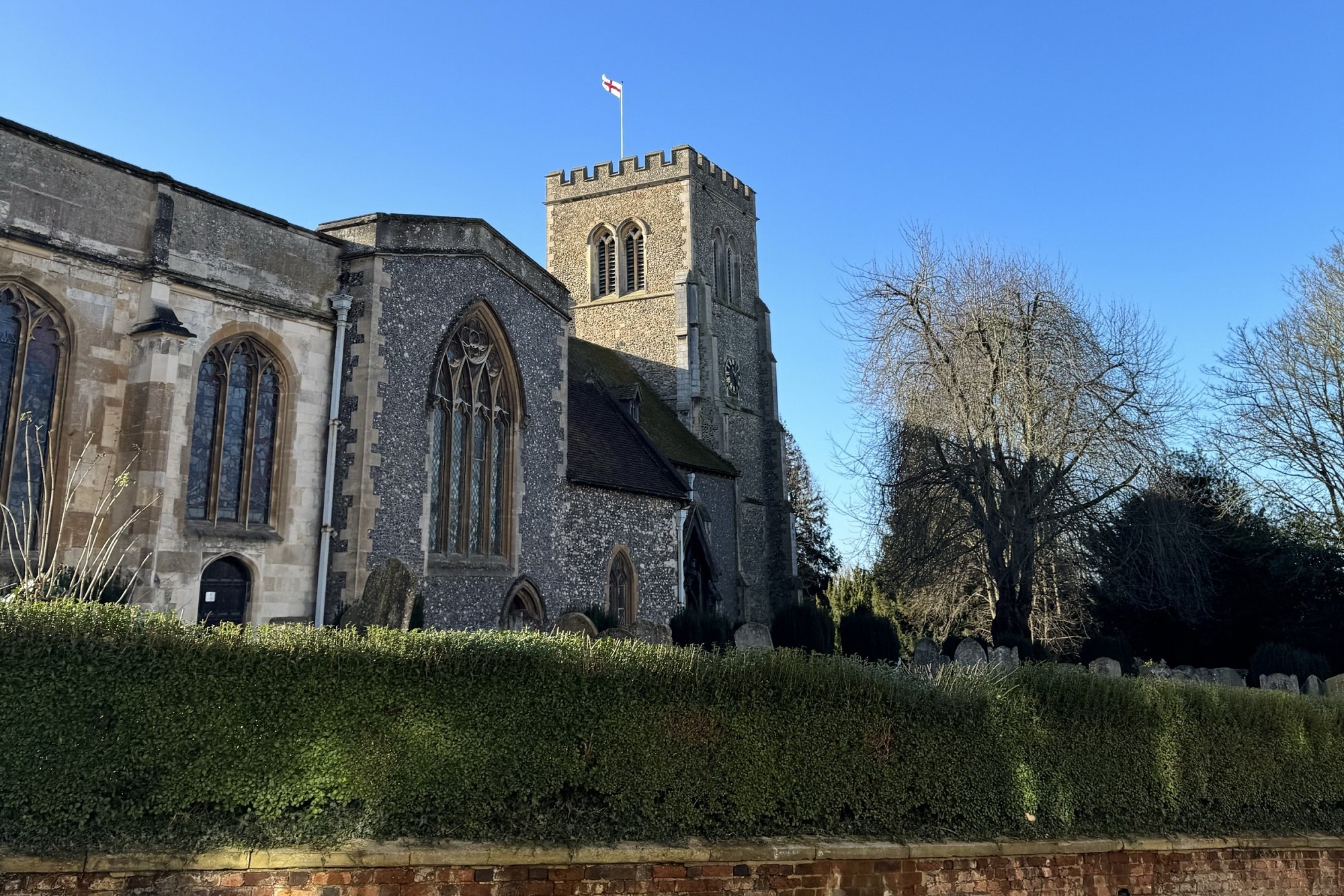 Church with bushes in front of it