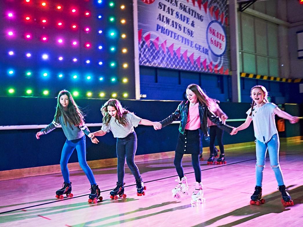 Group of girls roller skating