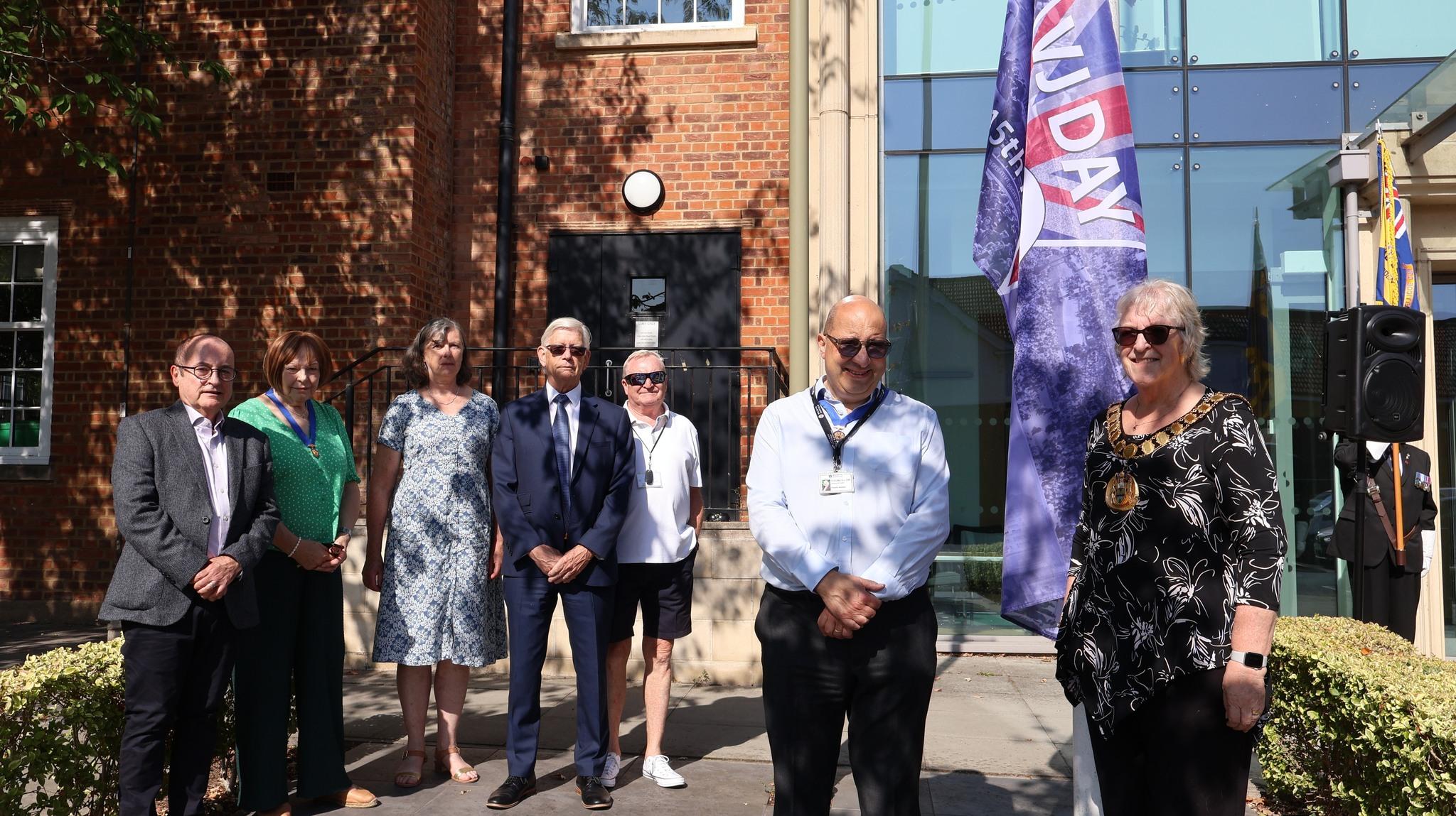VJ Day flag raising