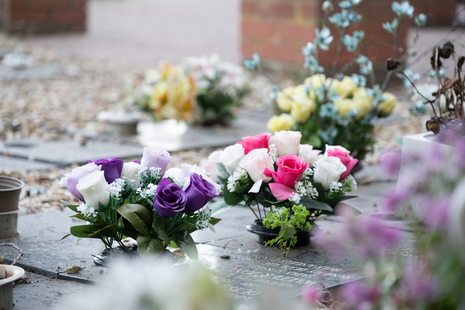 Colourful memorial flower bouquets