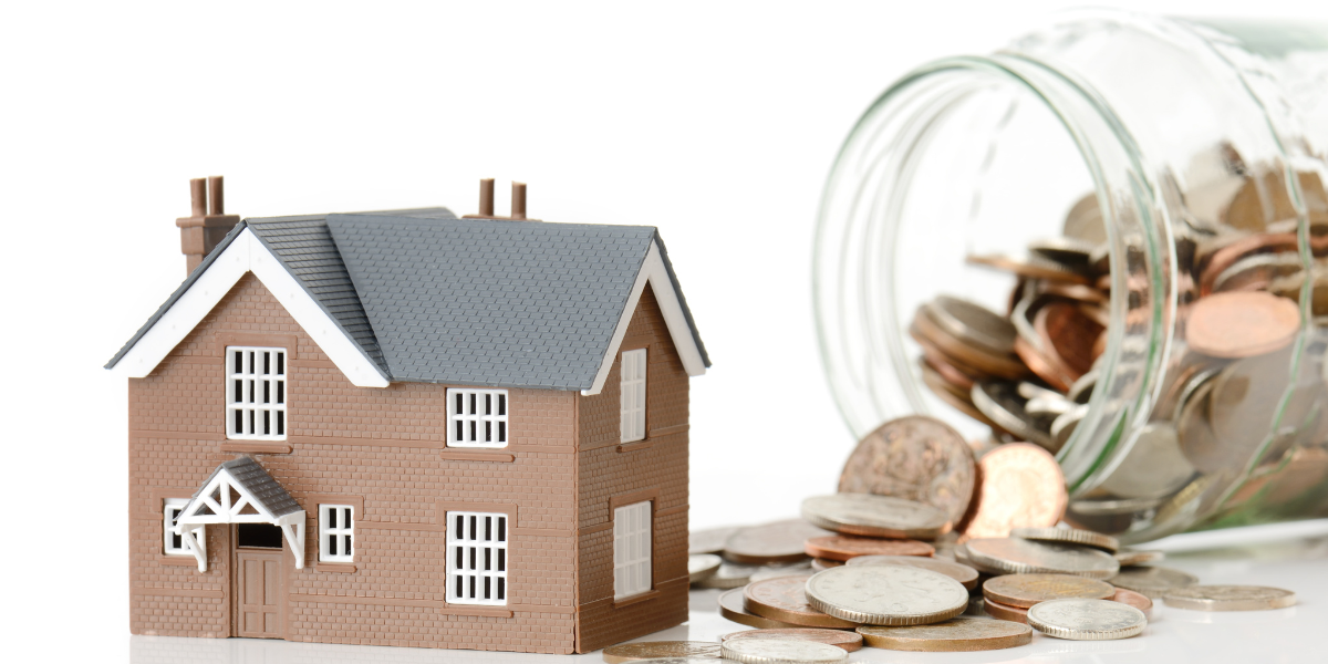 House and jar of coins.